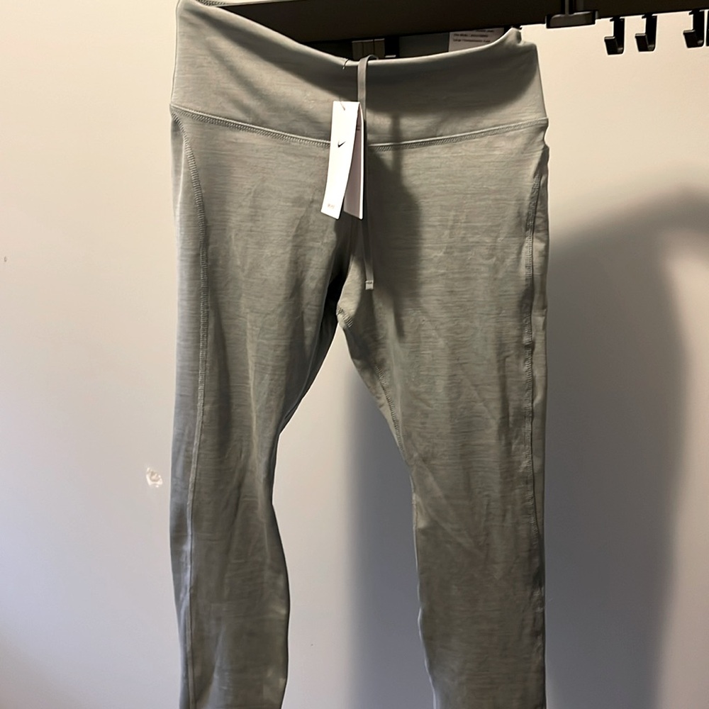 Nike Fast grey tight fit, mid rise, full length